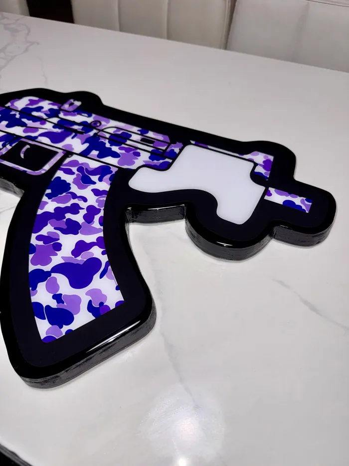 An epoxy wall piece with a mirror-finish face
